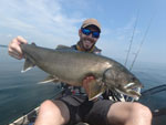 Lake Simcoe Lake Trout Matthew Randall holding a large Lake Trout on Lake Simcoe.